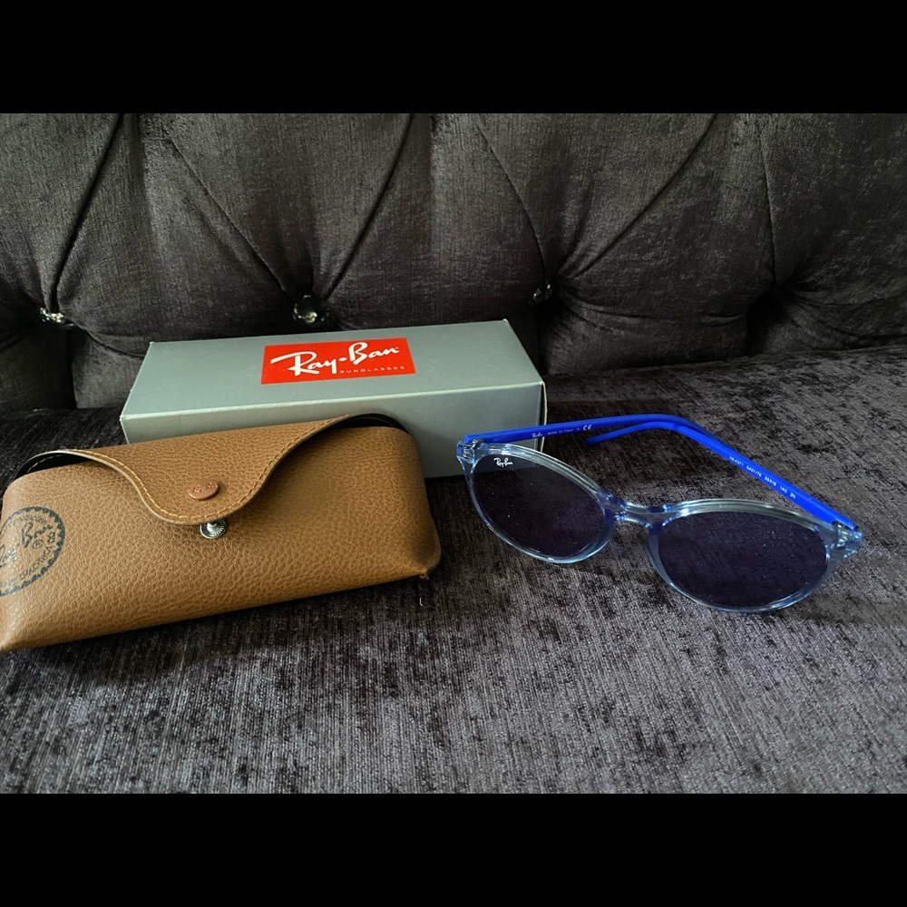 Never worn Ray Bans RB4371 light blue lens